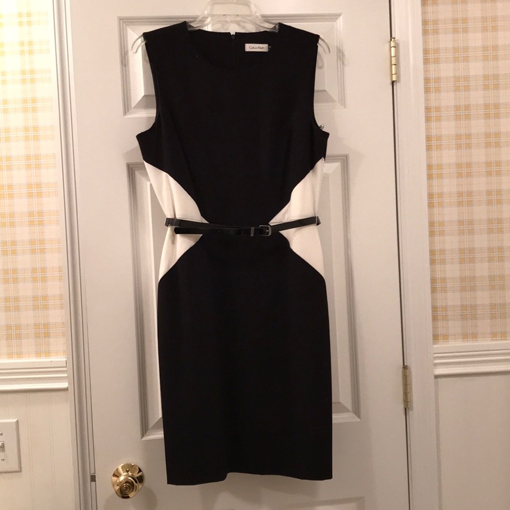 Calvin Klein sleeveless lined dress with belt.